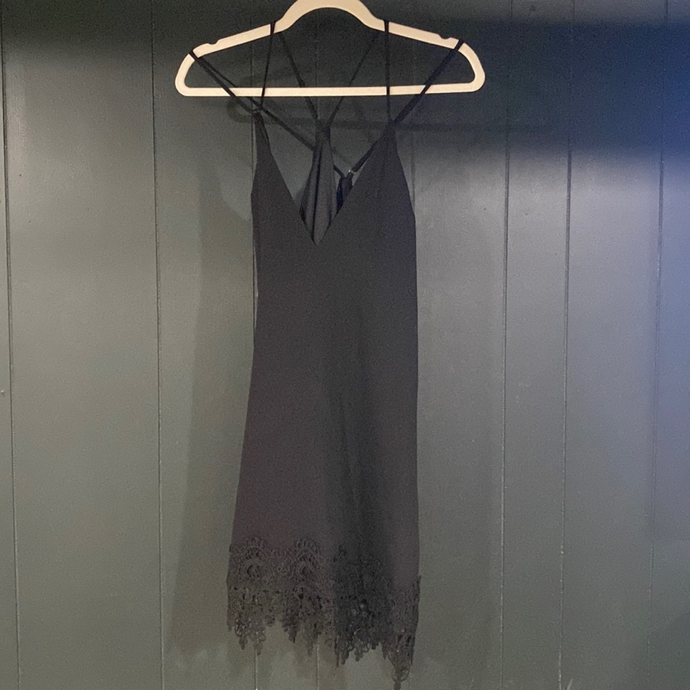 Black mini dress, low cut strappy back